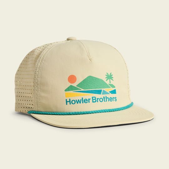 The Howler Brothers Aperture Tech Strapback | Bahia de Howler is a beige breathable hat with teal rope, quick-dry perforated sides, and a colorful hill, sun, and palm tree graphic—ideal for outdoor adventures.
