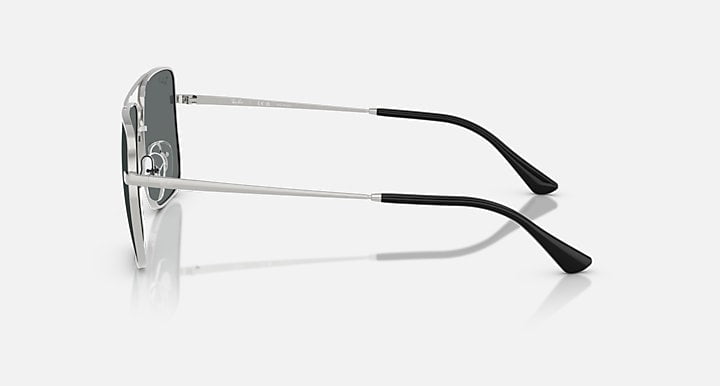 Side view of Ray-Ban Ari sunglasses in silver with dark grey polarized lenses and black temple tips, featuring UV protection, positioned on a plain light background.