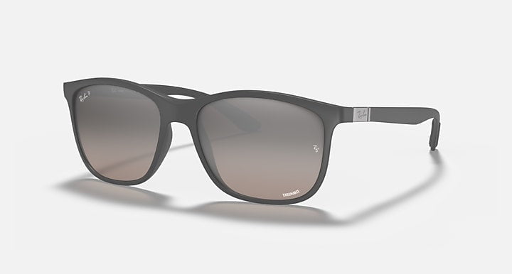 Ray-Ban Chromance rectangular sunglasses in sand grey with grey mirror silver lenses, featuring a small logo and silver temple detail, displayed on a plain light background.