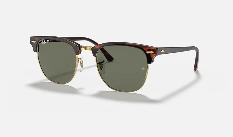 A pair of Ray-Ban Clubmaster sunglasses in Red Havana with green polarized lenses, displayed on a plain white background.