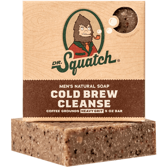 Dr.Squatch Cold Brew Cleanse Soap, labeled "heavy grit" and made with coffee grounds, is shown both in its packaging and outside the box.