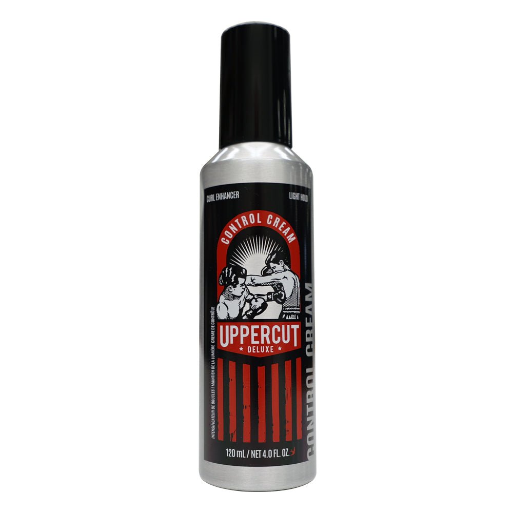 A silver and black bottle of Uppercut Deluxe Control Cream, a styling cream with a red and black label from Uppercut Deluxe, featuring two boxers and details highlighting frizz control.