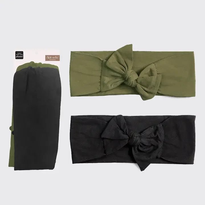 KITSCH Cotton Adjustable Headband 2pc pack features a stylish olive green headband with a bow and a classic solid black headband in packaging—both perfect for comfortable, versatile wear on any occasion.