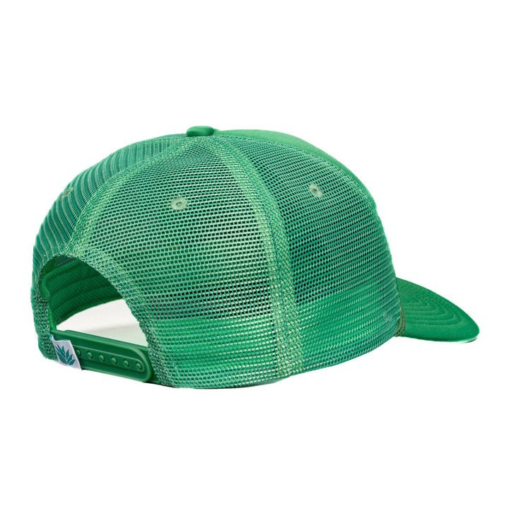 The Country Store Hat by Sendero Provisions Co. is a green meshback cap with an adjustable snapback closure and a small tag on the strap, offering classic vintage trucker hat details when viewed from the back.