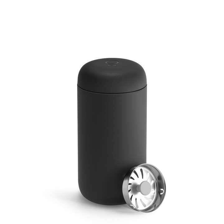 A Fellow Carter Move Travel Mug in matte black with a removable stainless steel infuser is displayed on a white background.