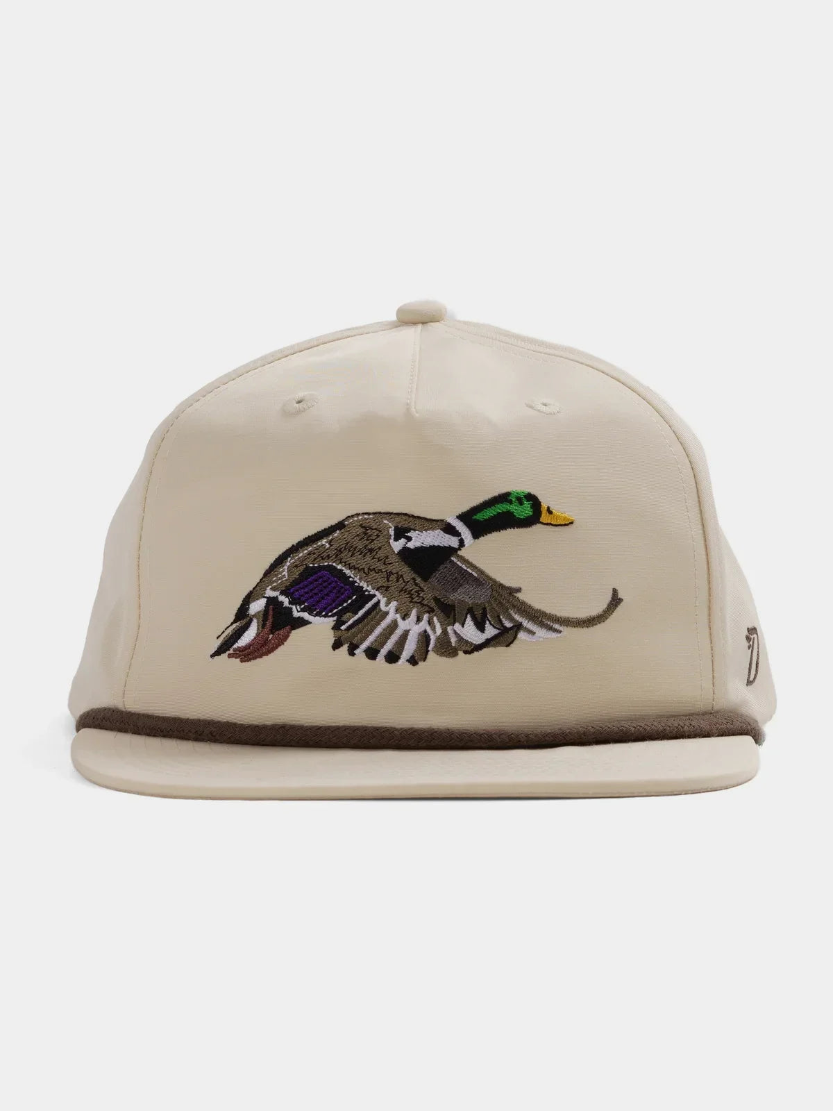 The Duck Camp Grandpa Hat | Mallard is a beige adjustable hat featuring an embroidered flying mallard duck on the front.