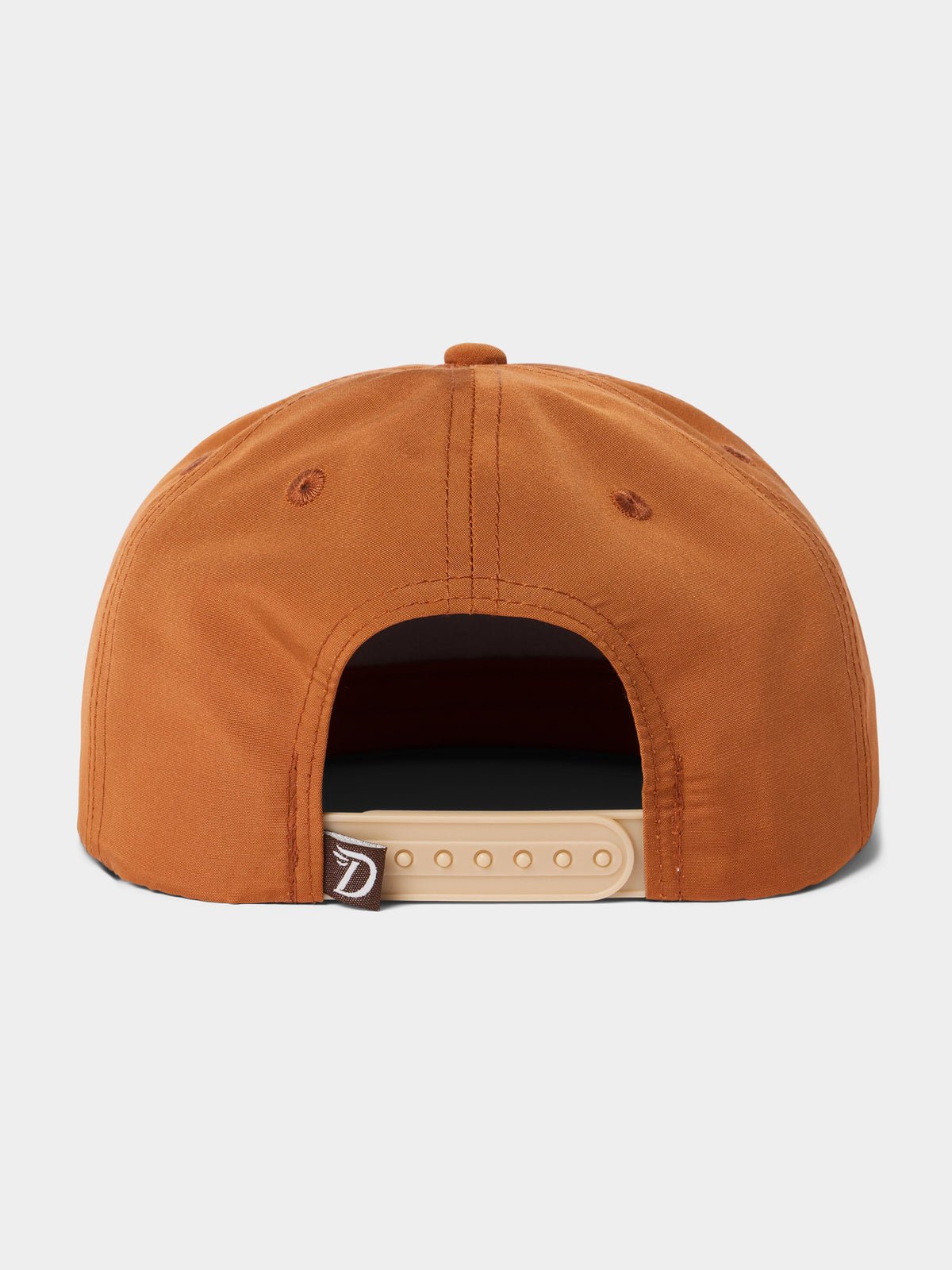 Back view of the Duck Camp Grandpa Hat | Pointer: brown polyester shell, beige adjustable snap closure, and a small black tag on the left.