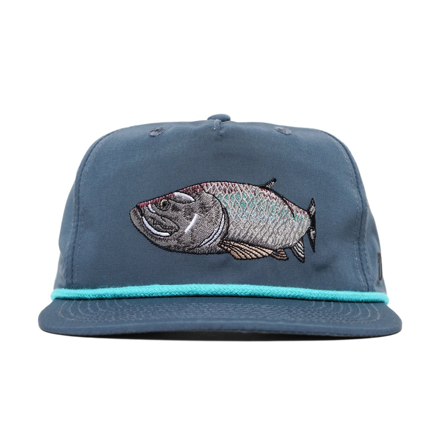 The Duck Camp Grandpa Hat | Tarpon features an embroidered Tarpon on the front, a blue color, and a turquoise accent along the brim.