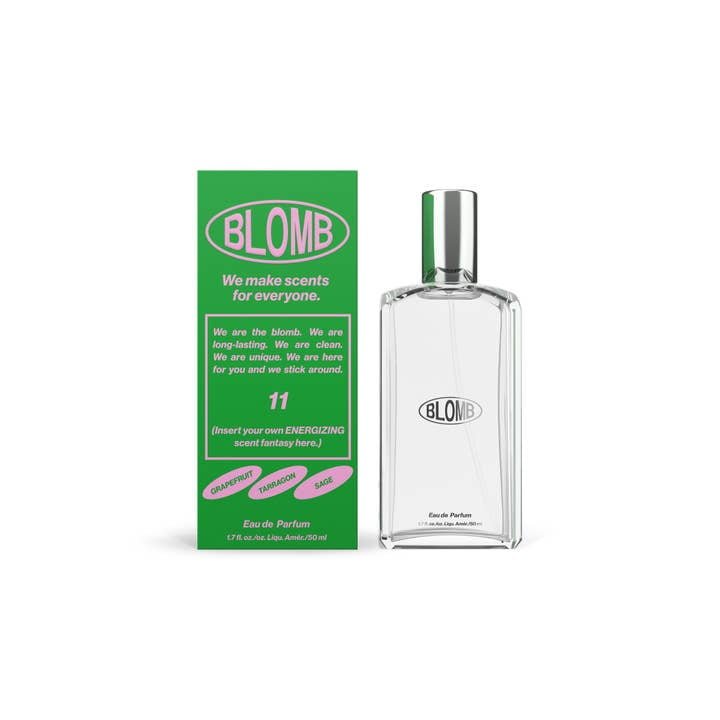 A clear perfume bottle labeled "No.11 Eau de Parfum | Blomb" stands next to a green box with white and pink text, describing this Blomb fragrance as a long-lasting, energizing Eau de Parfum suitable for everyone.