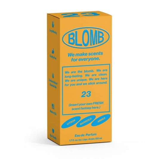 A yellow and blue "Blomb" box labeled No. 23 Eau De Parfum features the phrase "We make scents for everyone." This 1.7 fl oz (50 ml) fragrance blends citron, marigold, and amber—ideal for citrus perfume enthusiasts.