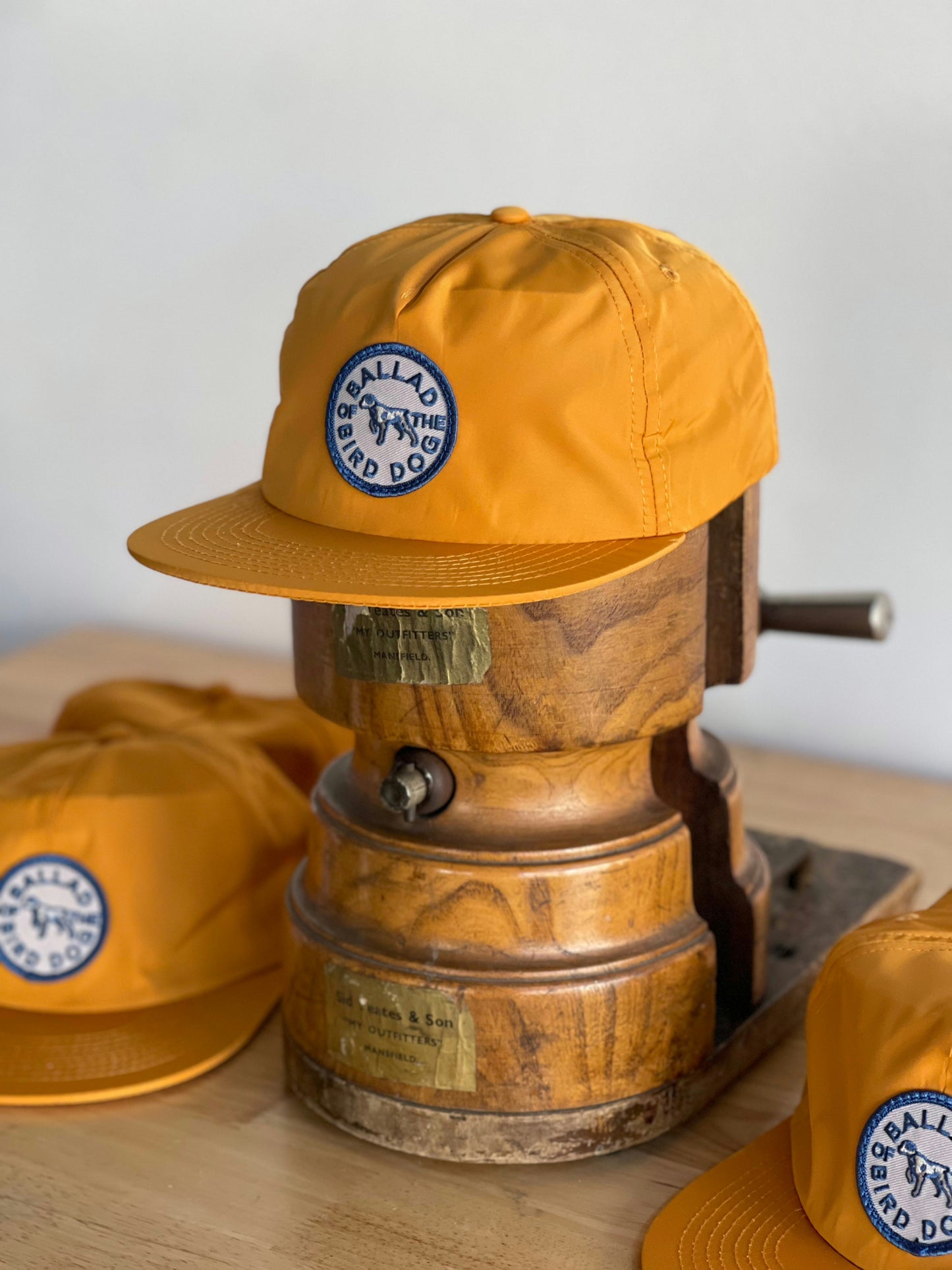 The Ballad of the Bird Dog Shop Hat | Circle Clubhouse Tradition features a unique circle logo patch, perfect for fans of the brand's signature style.