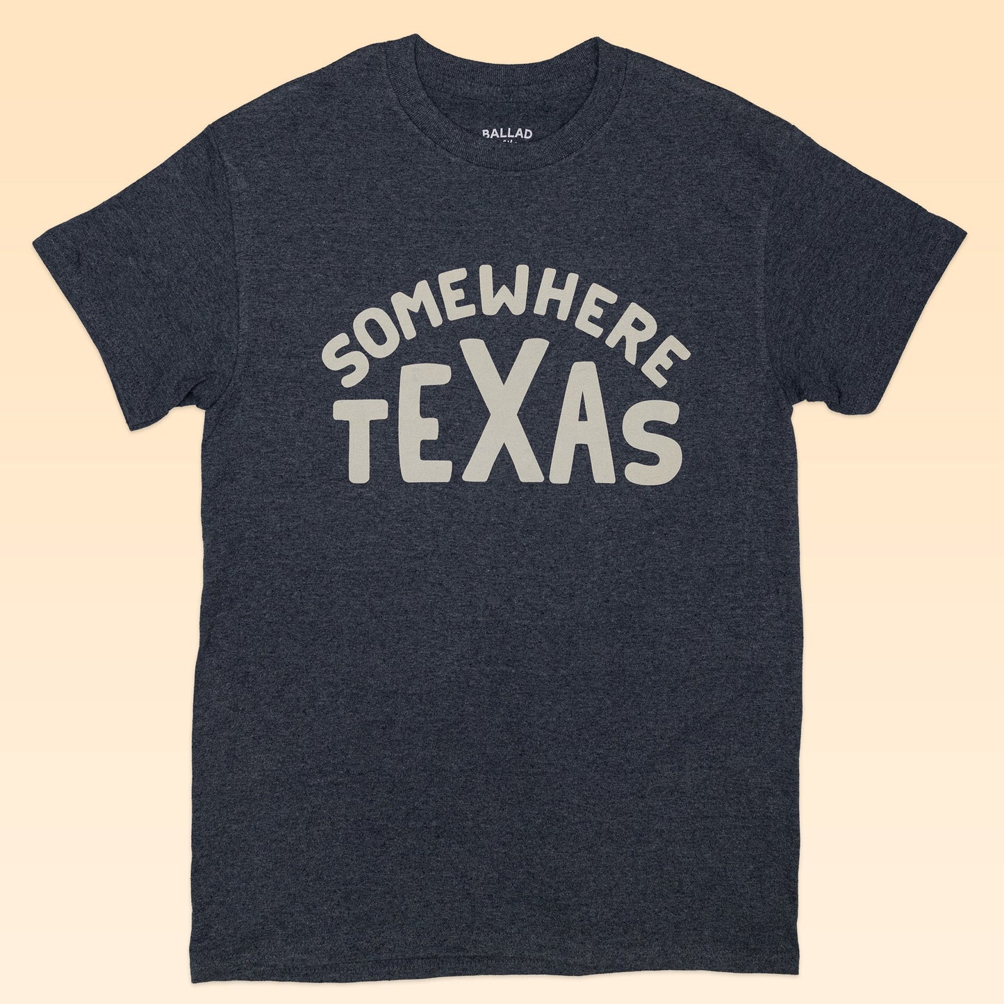 The Ballad of the Bird Dog Shop Shirt features “Somewhere Texas” in bold white letters on dark gray, capturing the spirit of small-town destinations like Round Top, TX.