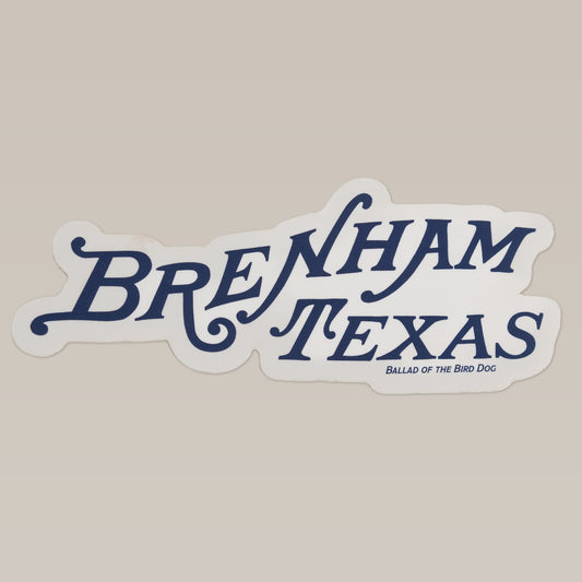 The Shop Sticker | Brenham Texas by Ballad of the Bird Dog features stylized "Brenham Texas" text with "Ballad of the Bird Dog" below on a light background—perfect as a versatile logo decal for any surface.