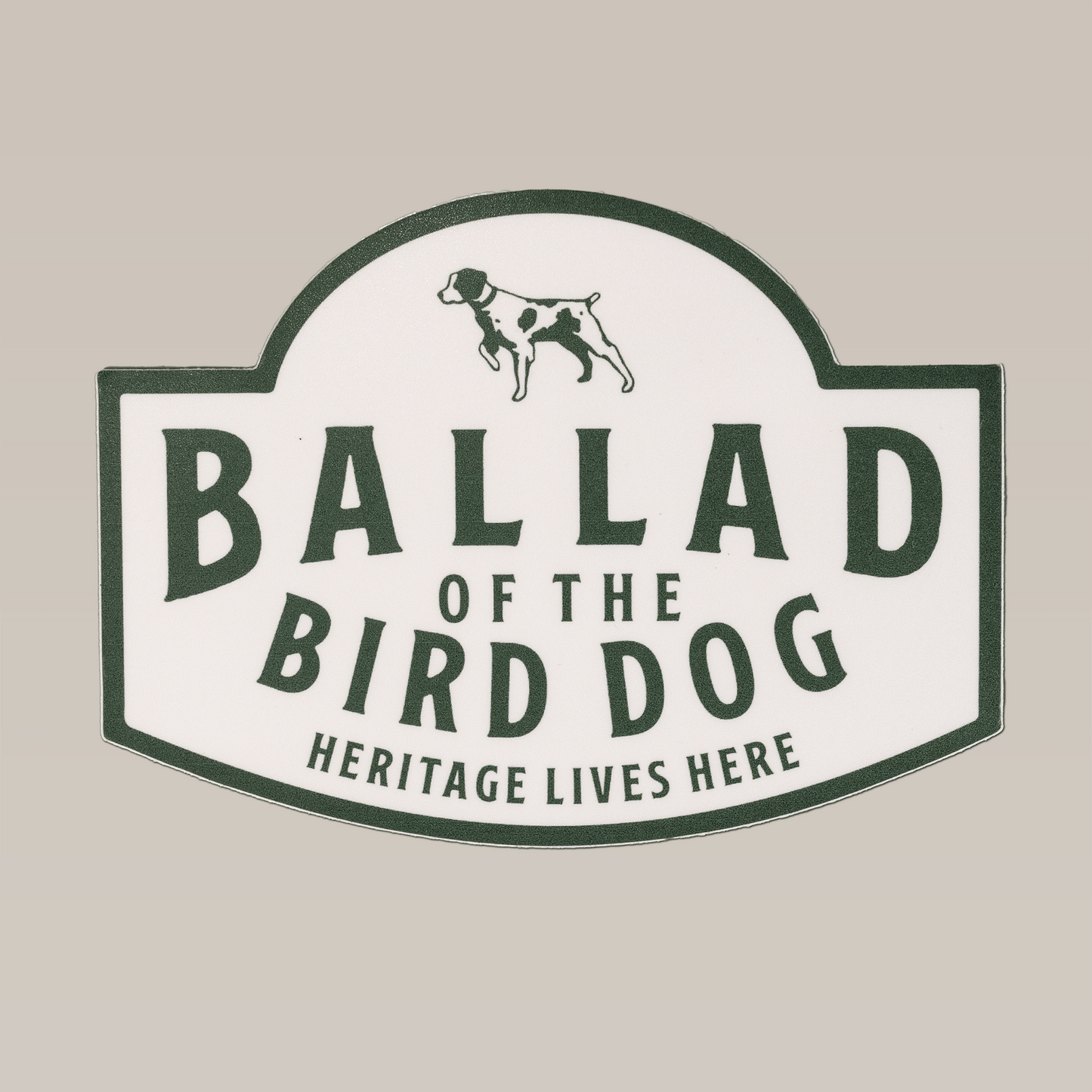 The Ballad of the Bird Dog Shop Sticker features "Heritage Lives Here" text and a dog illustration—ideal for fans of unique decor and durable outdoor stickers.