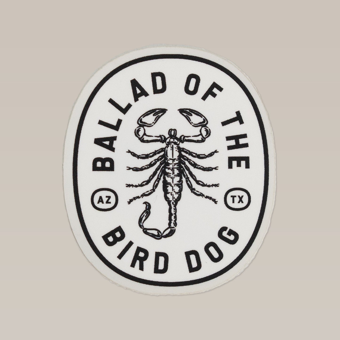The Shop Sticker | Scorpion by Ballad of the Bird Dog features a bold black and white logo with "Ballad of the Bird Dog," "AZ," and "TX"—a shop favorite from the Desert Series.