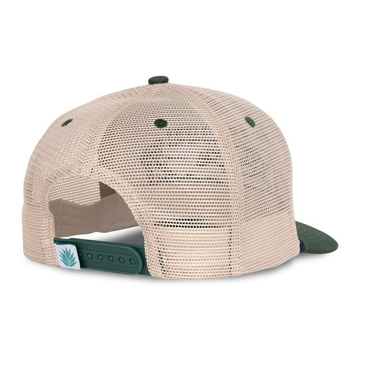 The Skinny Cows Hat by Sendero Provisions Co. features a beige mesh back, adjustable green snap closure, and a small green emblem tag—perfect for anyone working under the sun.