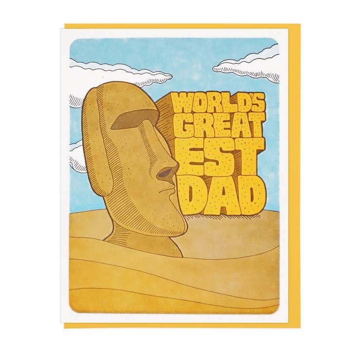 The "World's Greatest Dad Moai" card by Lucky Horse Press features an illustrated Easter Island head, bold yellow text on a blue sky, is blank inside, and has a recycled cover for an eco-friendly touch.