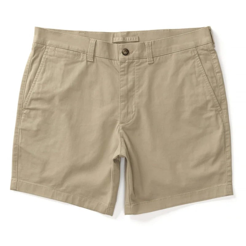 A pair of Duck Head 7 in Gold School men's chino shorts with a 7" inseam, belt loops, side pockets, and a button fly is laid flat on a white background.