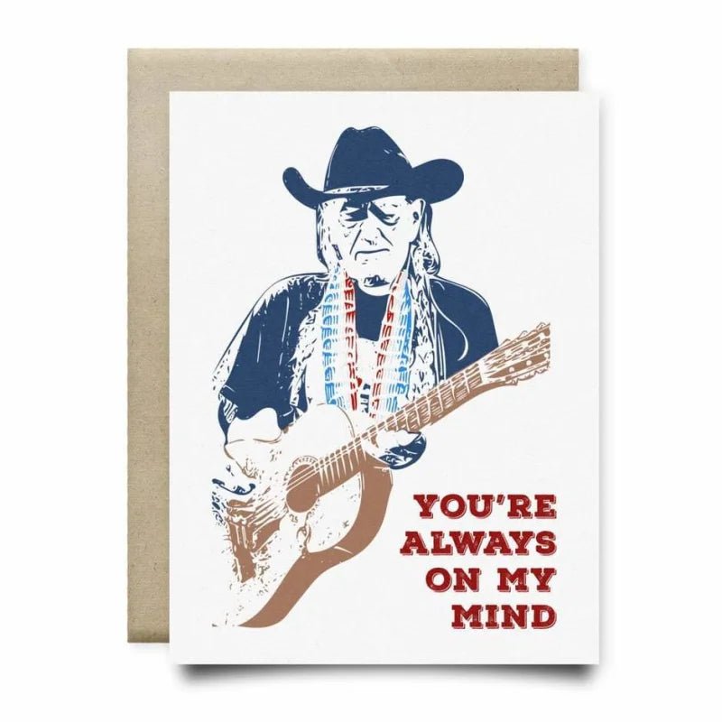 The Always On My Mind Card by Anvil Cards is an A2 linen paper greeting card with an illustrated cowboy playing guitar and "You're always on my mind" in red. Blank inside for your personal message.