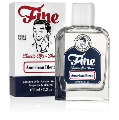 A 100ml bottle of Fine Accoutrements American Blend Classic Aftershave sits beside its retro-branded box. Enjoy this classic aftershave and its signature barbershop scent from Fine Accoutrements.