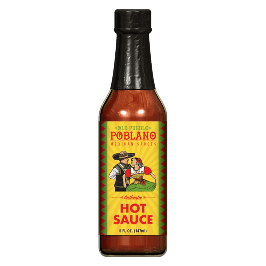 A bottle of Authentic Hot Sauce | Old Pueblo Poblano features a yellow and red label with two people in traditional Mexican attire and delivers an authentic kick with flavorful chili peppers. Brand: Old Pueblo Poblano.