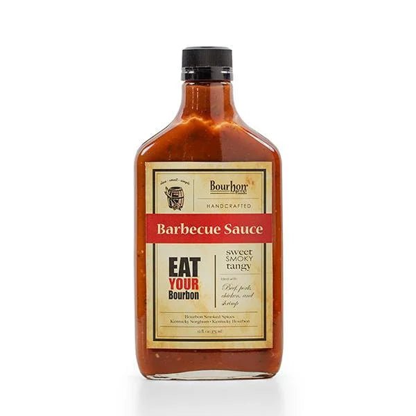 A bottle of Bourbon Barrel Foods' BBQ Sauce | Bourbon Barrel Foods with a brown label, featuring sweet, smoky, and tangy flavors.