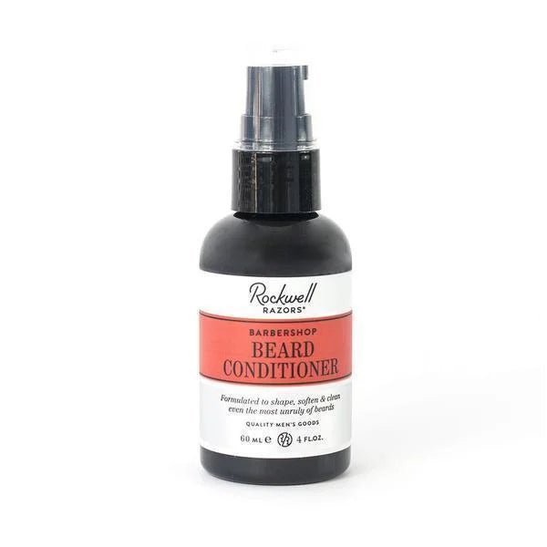 A 60 mL (2 fl. oz.) black bottle of Rockwell Razors Beard Conditioner with a pump top and red and white label, ideal for daily beard grooming and superior care.
