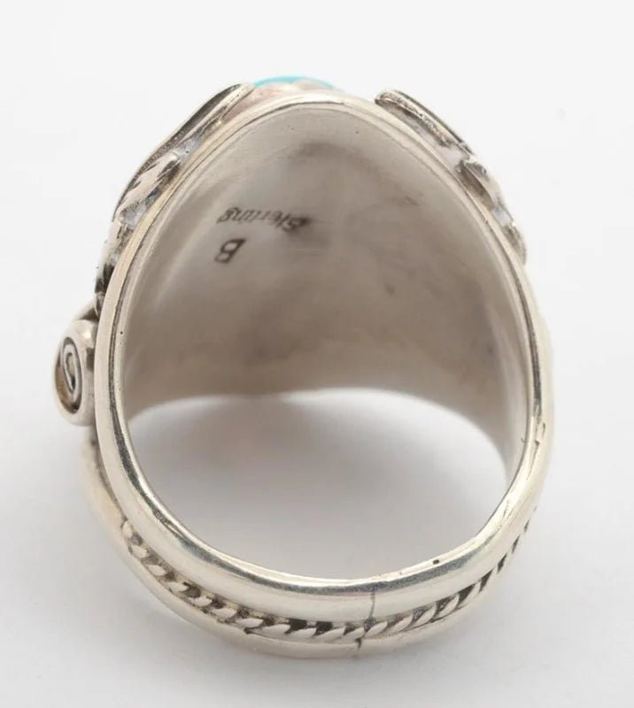 Silver turquoise ring by Benjamin Piaso featuring a vibrant turquoise stone