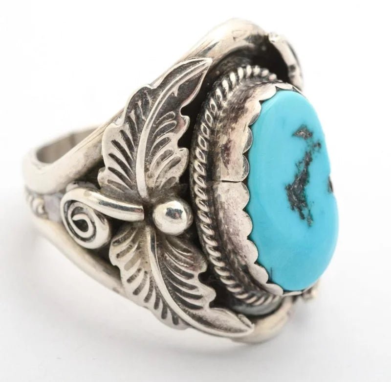 Silver turquoise ring by Benjamin Piaso featuring a vibrant turquoise stone