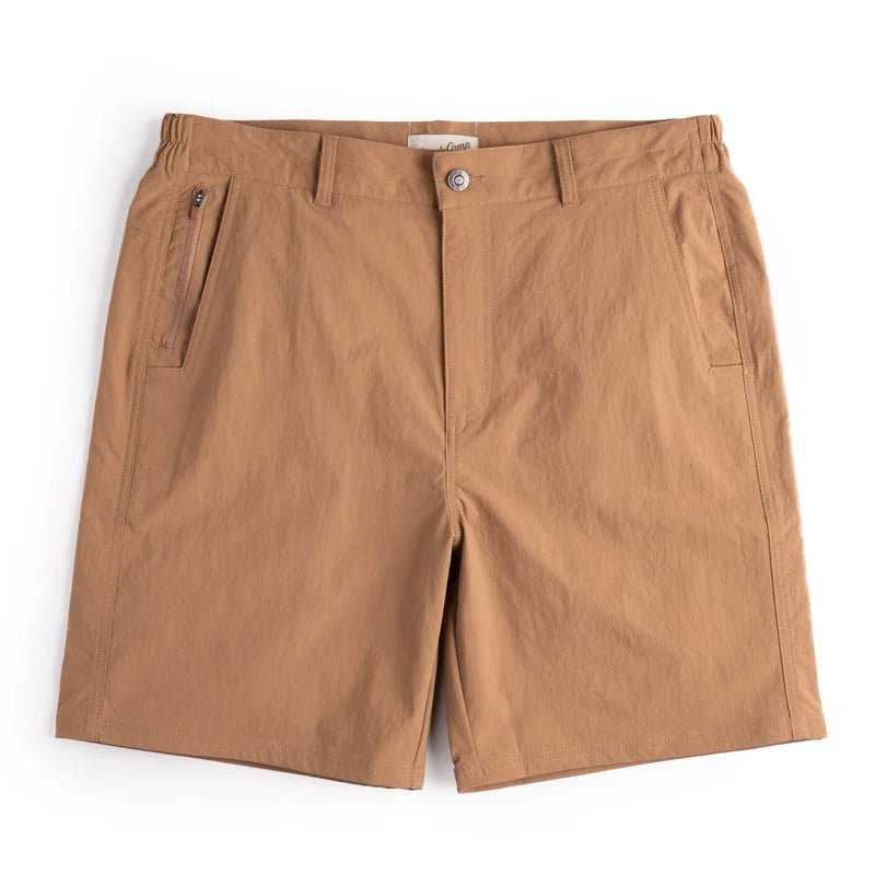 The Drifter Shorts by Duck Camp are light brown quick-dry fishing shorts with belt loops, button closure, zip fly, and three pockets, shown flat on a white background.