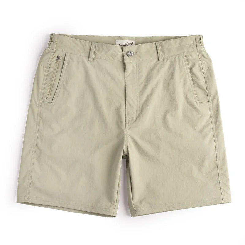 The Drifter Shorts by Duck Camp are light beige men’s fishing shorts with quick-dry fabric, button and zip closure, belt loops, and three front pockets, shown flat on a white background.