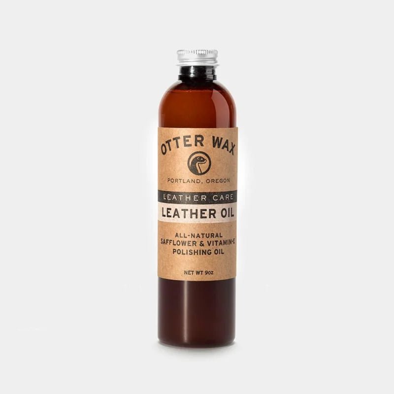 A 9 oz brown bottle of Otter Wax Leather Polishing Oil, an all-natural leather care product and conditioner enriched with safflower oil and vitamins.