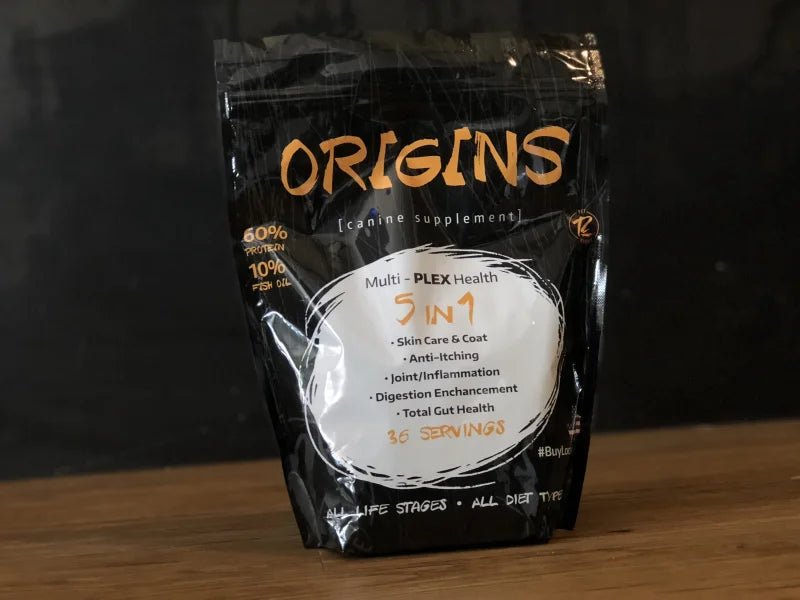 Origins Canine Supplement by Rogue Pet Feed offers 5-in-1 benefits—supporting skin, joints, and digestion—with a 60% protein digestive enzyme blend and omega-3 fish protein. Each black bag contains 36 high-protein servings for your dog.