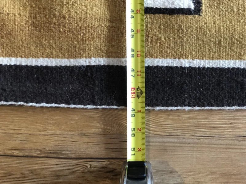 Vintage Two Grey Hills Rug with gold, white, and black stripes for timeless style
