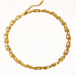 Denise Bold Chain Necklace by Flanerie by MAIQ, a gold-tone 18K gold chain with U-shaped links and a small adjustable extender, designed as a hypoallergenic necklace.