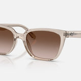 Ray-Ban RB2243D unisex sunglasses featuring translucent frames and brown gradient lenses.