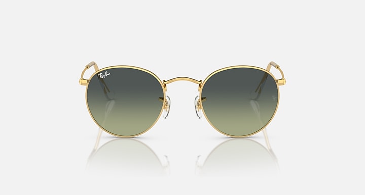 Ray-Ban 3447 Round Metal sunglasses with round gold frames and gradient green vintage lenses, shown against a white background.