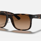 Ray-Ban 4165 Justin sunglasses in tortoiseshell with square frames and brown gradient lenses, shown on a white background—classic Wayfarer-inspired style with a modern twist.