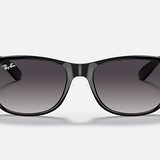 Front view of Ray-Ban 4202 Andy sunglasses in black with dark gradient lenses, displayed against a plain light background.