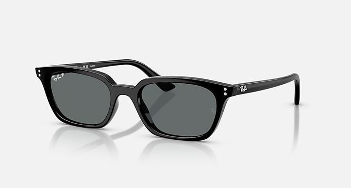 The Ray-Ban Zaya RB4456F sunglasses feature a sleek black injected rectangular frame with polarized dark grey lenses, displayed on a white background. The Ray-Ban logo is visible on the right lens and temple.