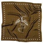 Introducing the ‘Feel the Fear’ Silk Scarf by Jenni Earle—a brown square accessory adorned with a striking white stylized snake and bird motif at its center, bordered by delicate white crosses. This thoughtfully designed scarf adds a meaningful touch of western flair to any outfit.