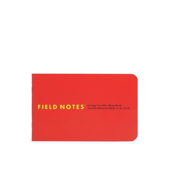 The Field Notes 1943 Two-way Memo Book, in red with yellow cover text, is shown closed against a white background.