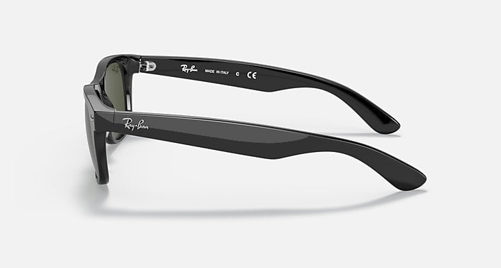 Black Ray-Ban 2132 New Wayfarer sunglasses shown from the side against a plain background, featuring G-15 green lenses, the Ray-Ban logo on the arm, and inner temple details.