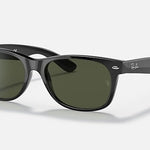 Ray-Ban 2132 sunglasses, Wayfarer-style with dark lenses, are shown on a white background.