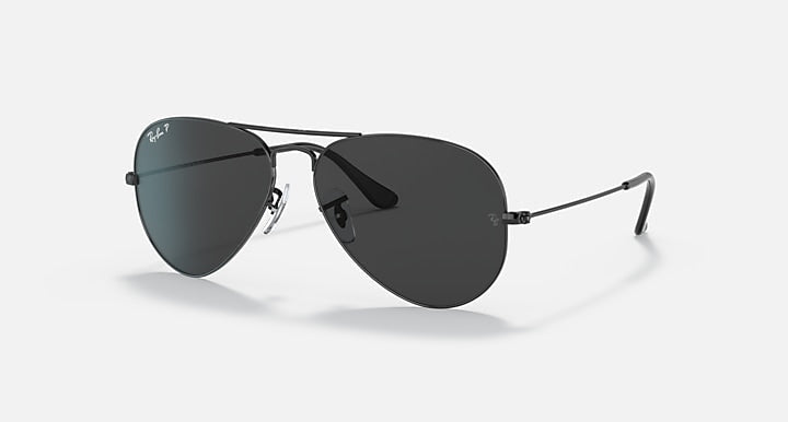 Ray-Ban 3025 Aviator sunglasses feature dark lenses and slim metal frames in a classic pilot style, shown on a light background.