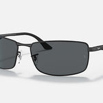 Ray-Ban 3498 rectangular black metal sporty sunglasses with dark tinted lenses and thin arms, displayed on a plain light background.