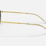 Ray-Ban 3565 sunglasses with gold frames and dark green lenses shown from the side, featuring slim metal arms and clear tips against a plain background.
