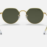 A pair of Ray-Ban 3565 sunglasses with green lenses, slim gold metal frames, and clear nose pads, shown against a plain white background.