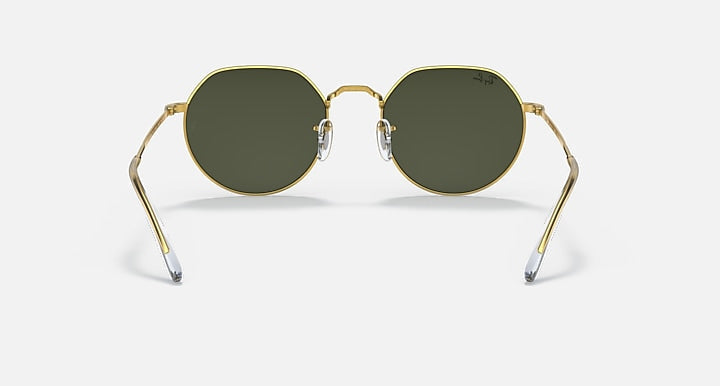 The Ray-Ban 3565 sunglasses feature gold metal frames, green-tinted lenses, and clear nose pads—custom eyewear inspired by the iconic Jack series, shown against a plain white background.