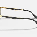 Ray-Ban 3569 square metal sunglasses with gold and black frames, dark mirror lenses, and black plastic earpieces displayed from a side angle on a plain background.